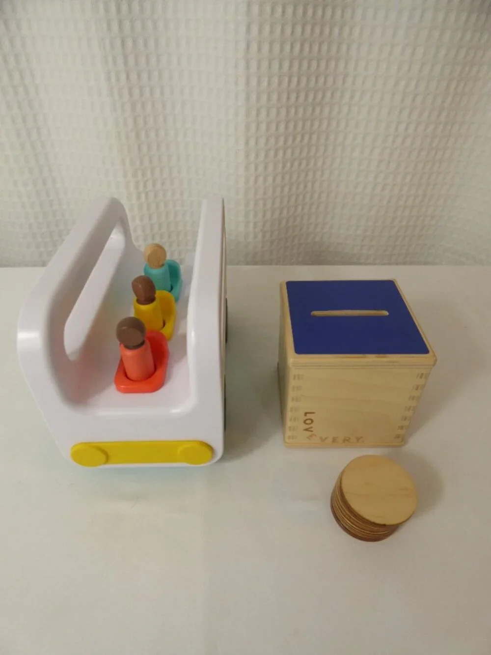 Lovevery Wooden Coin Bank, Coins, Bedtime for Zoe Book, & Wheel Around Town Bus